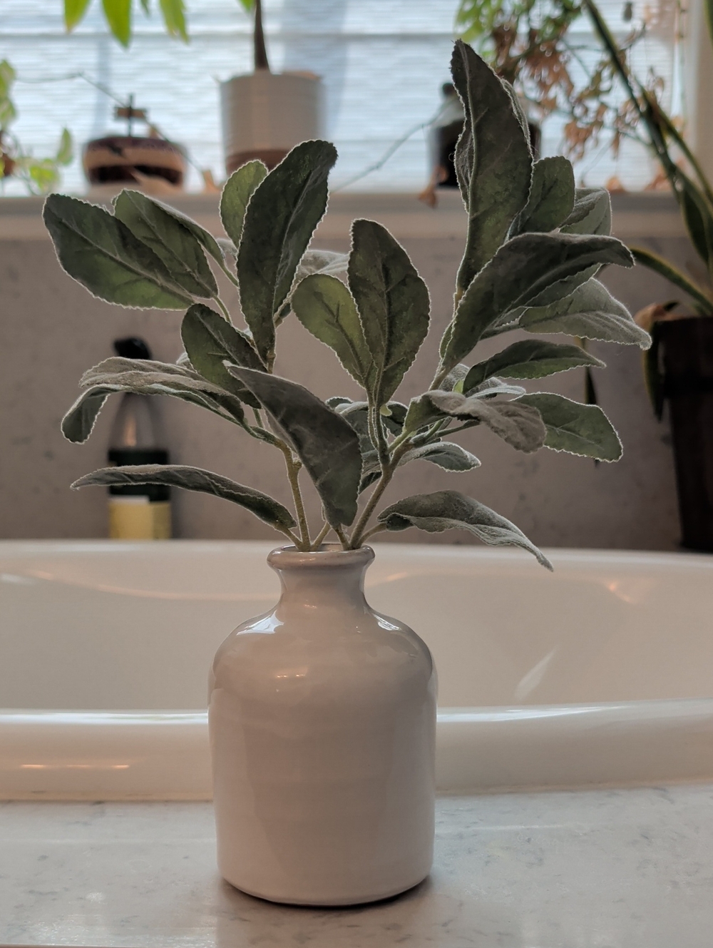 White Ceramic Bud Vase with Green Faux Foliage -
